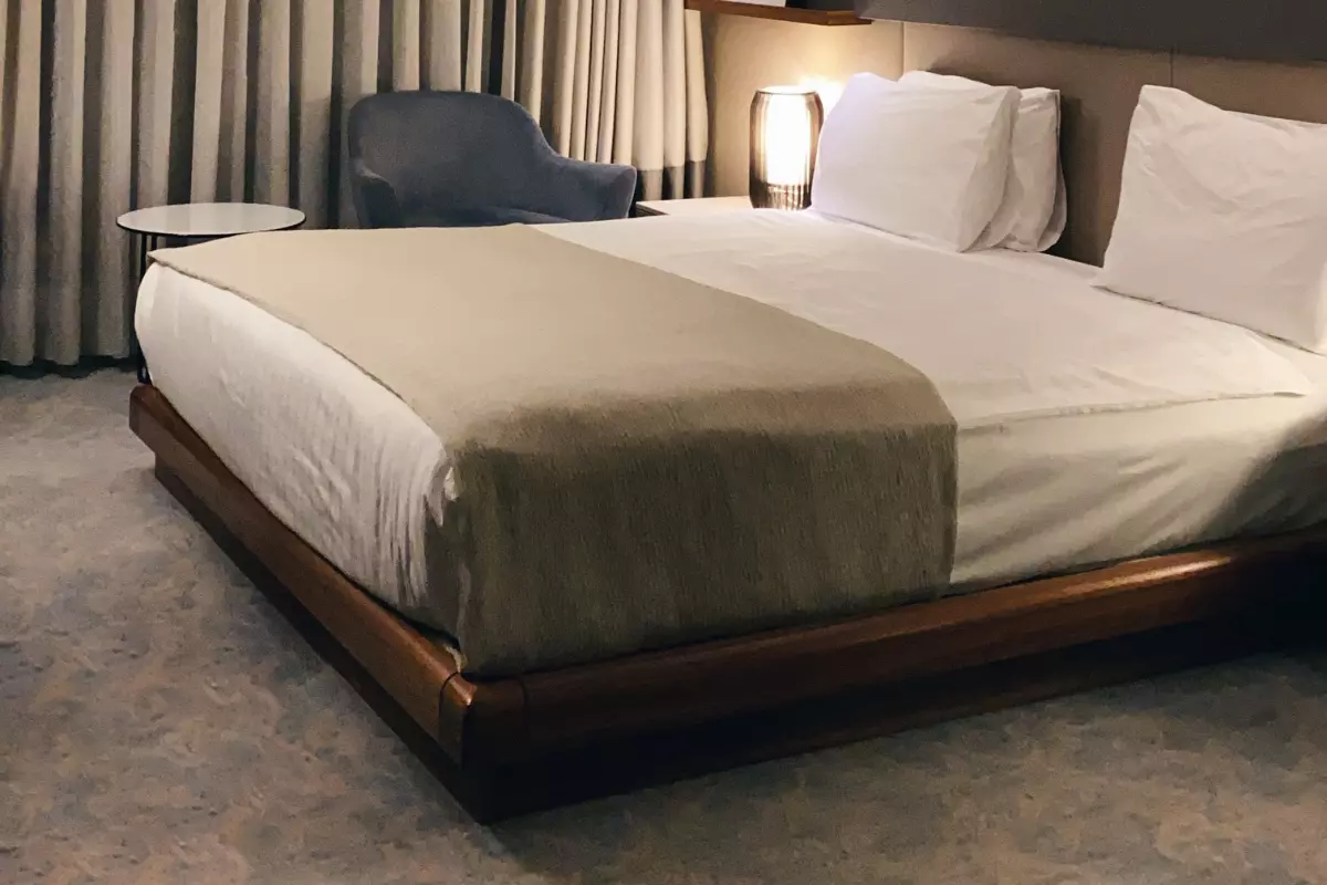 bed in a hotel room.